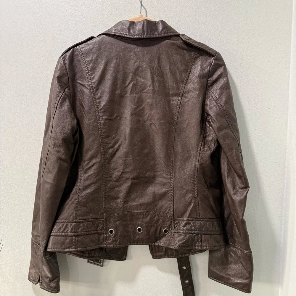 Rezrekshn bu Esther Chen woman leather moto jacket